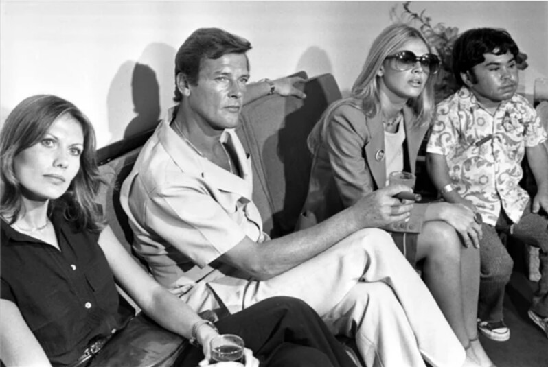 The Main Cast of The Man with the Golden Gun (minus Christopher Lee.  From left to right:  Maud Adams, Roger Moore, Britt Eckland, Herve Villechaize.